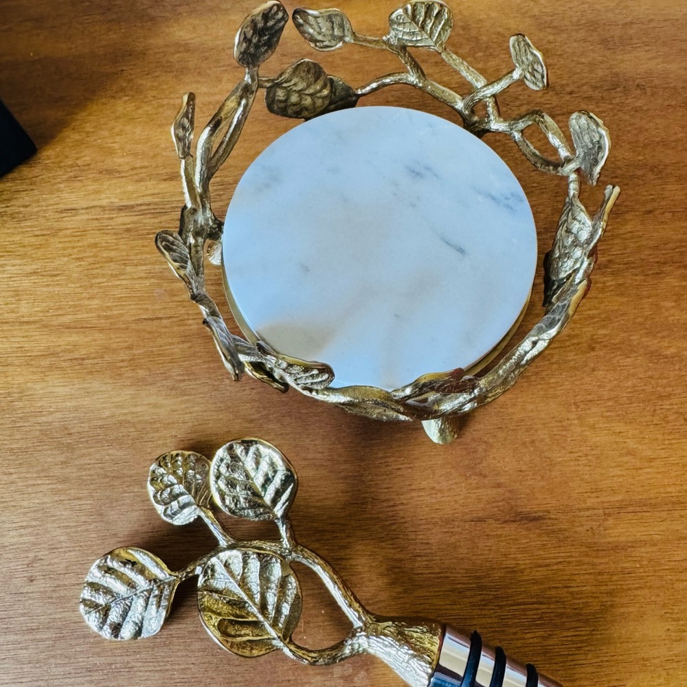 Michael Aram Gold Leaf Botanical Wine Set. gifted to me but I prefer silver.